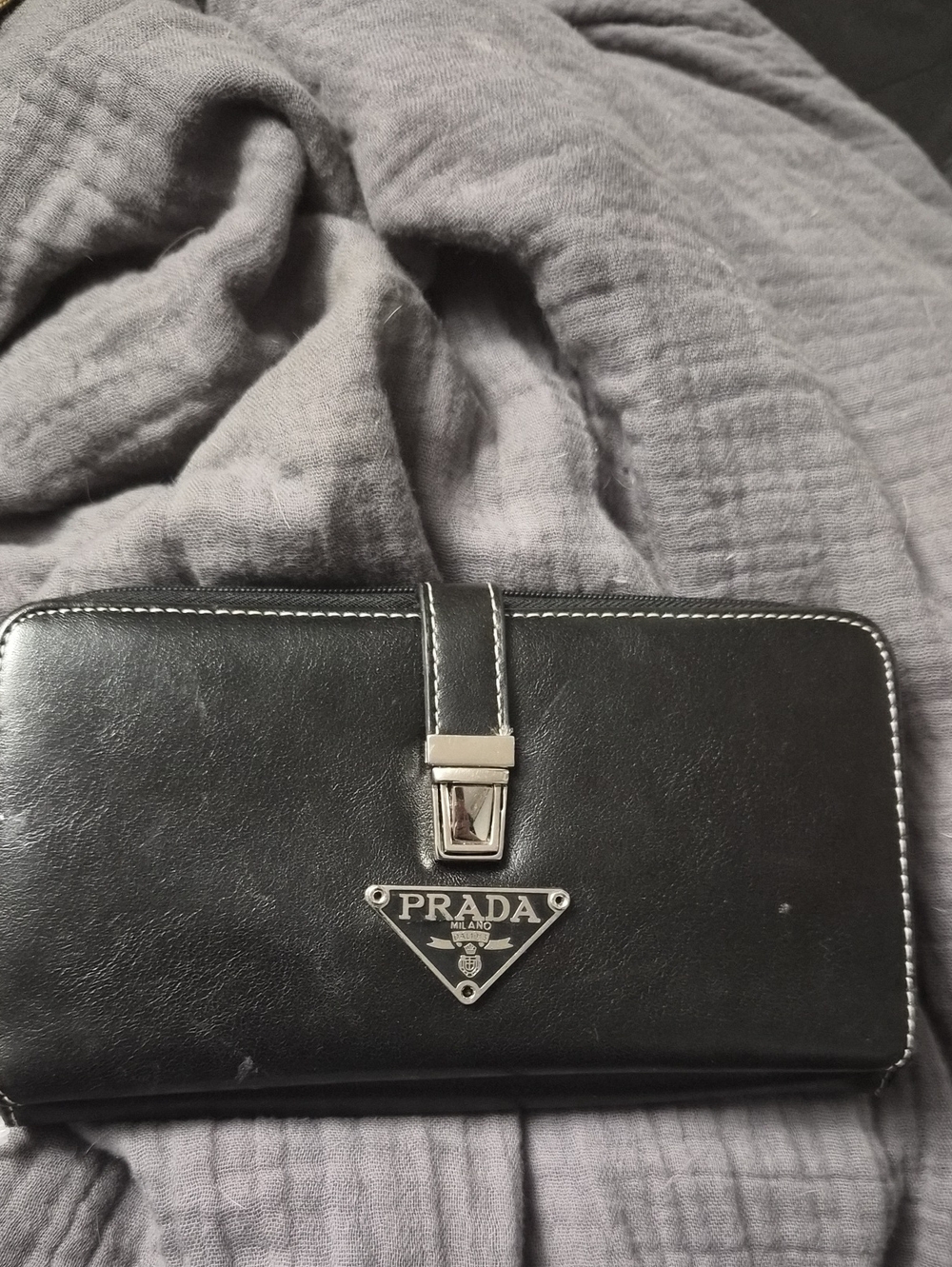 Black Leather Zip-Around Wallet with Silver Logo